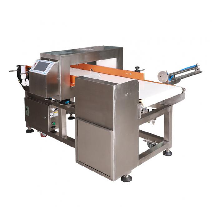Línea detector de metales de la producción alimentaria del precio de fábrica automático del transportador con rechazo automático del empujador